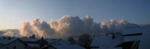 Fotos: schneebedeckte Dcher, leuchtende Wolken
