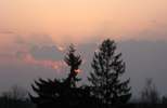Foto: Morgenrot mit Strahlen im Vulkanstaub