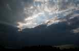 Foto: Abendstimmung mit von hinten beleuchteter Wolkenkante